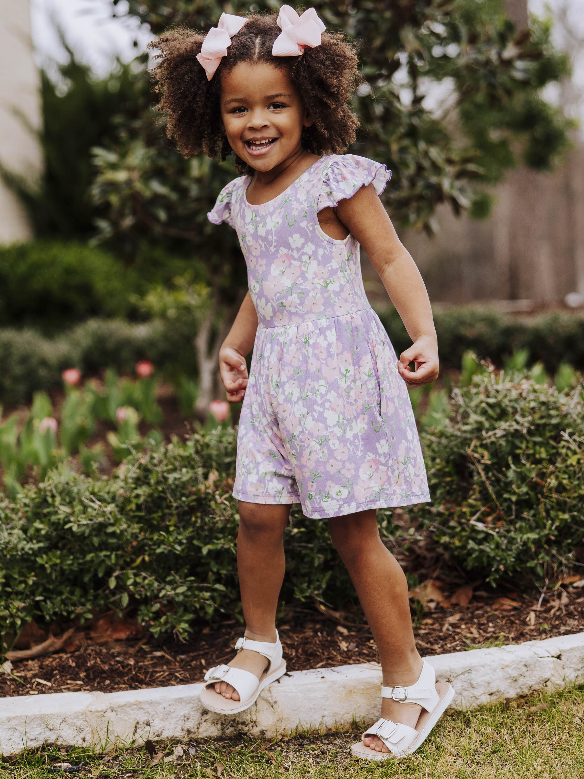 Short Leggy Romper - Pastel Blooms Lined Pockets Ruffled Legs