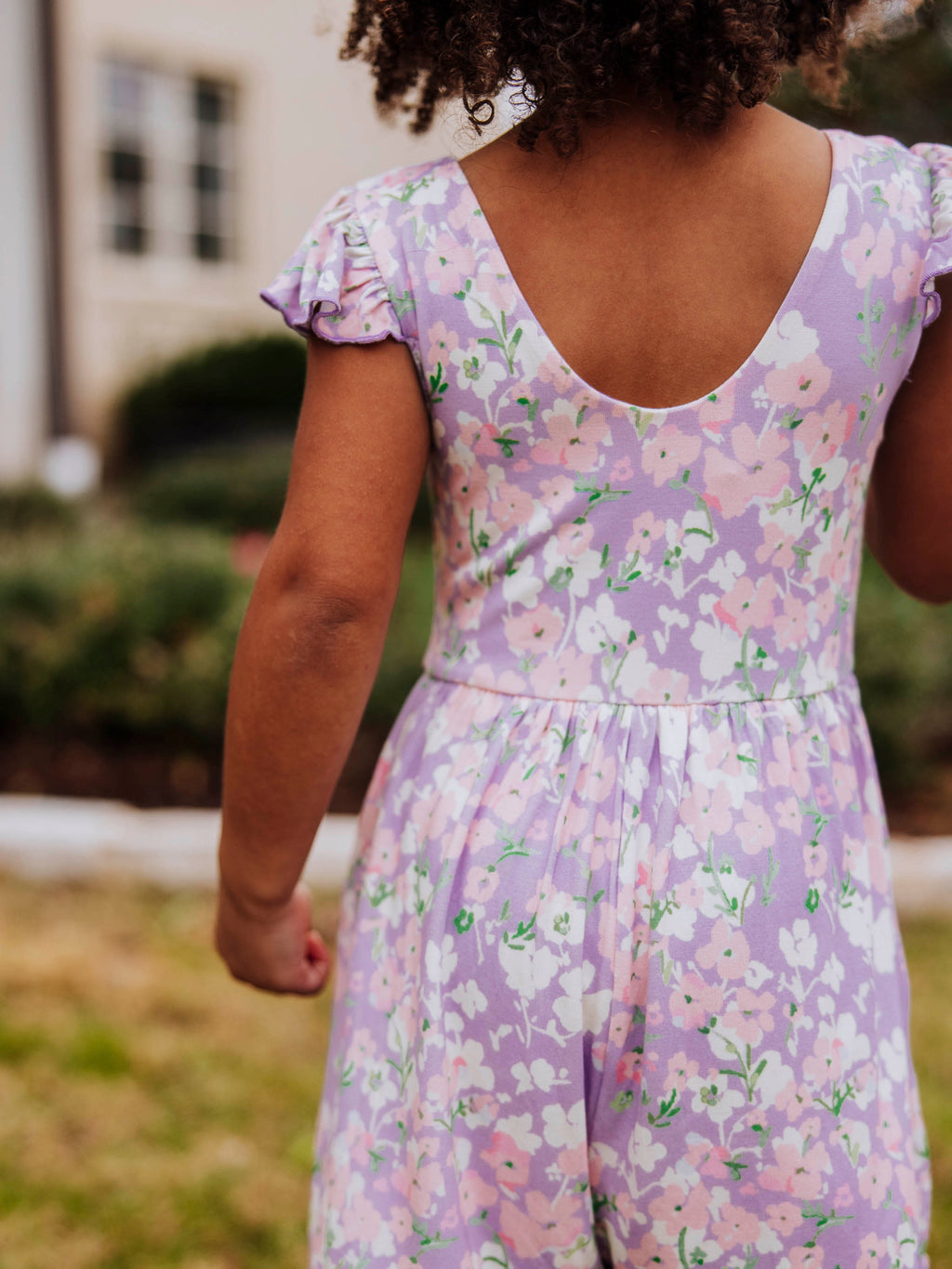 Short Leggy Romper - Pastel Blooms Lined Pockets Ruffled Legs