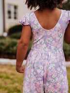 Short Leggy Romper - Pastel Blooms Lined Pockets Ruffled Legs