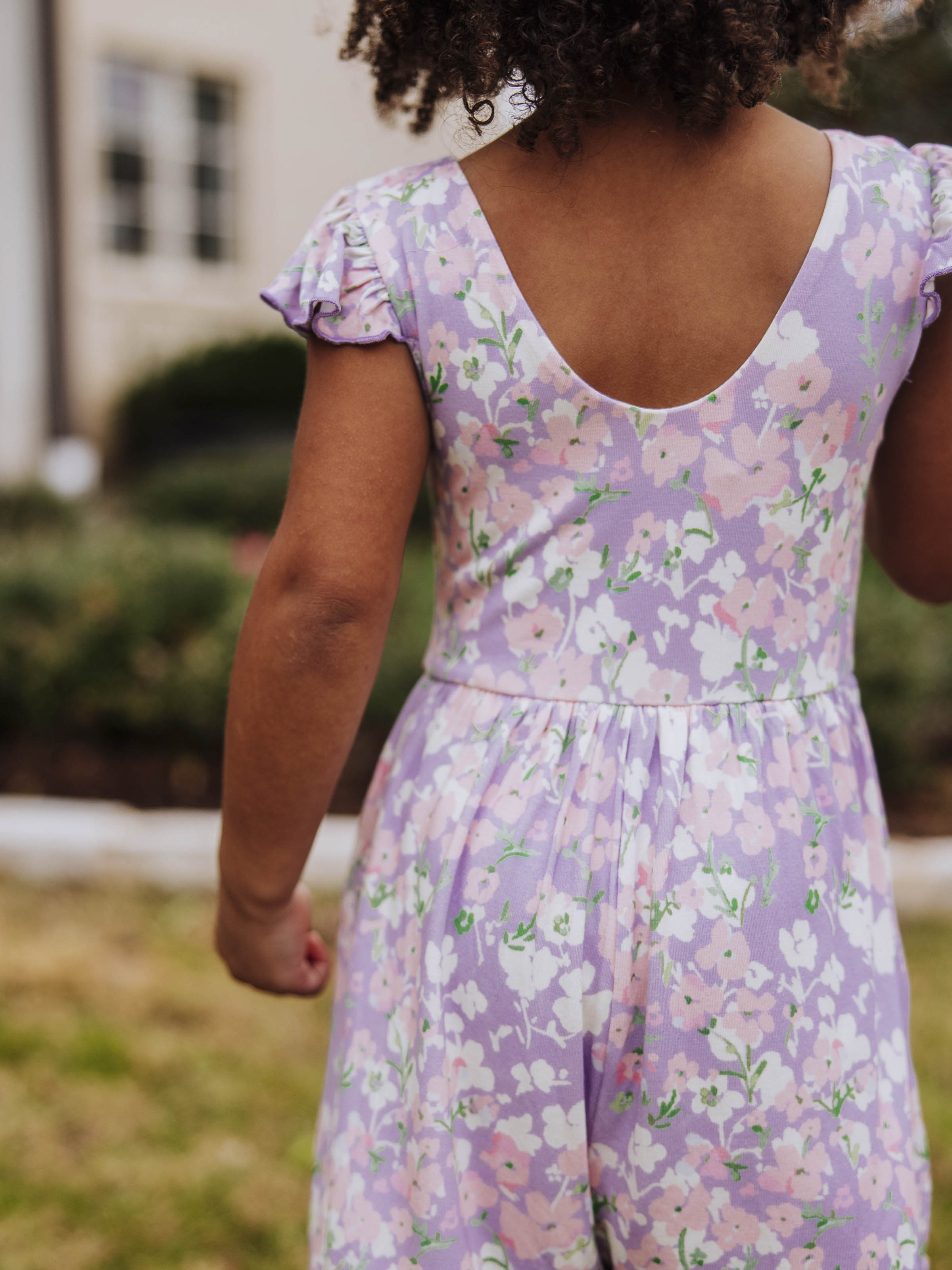 Short Leggy Romper - Pastel Blooms Lined Pockets Ruffled Legs