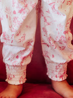 Smocked Romper - Falling Pink Petals Cotton Lined Puff Sleeves